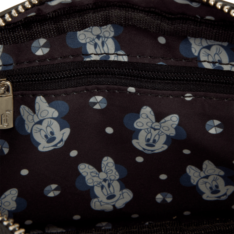 Minnie Mouse patterned interior lining inside the Loungefly Studs & Chains Crossbody Bag