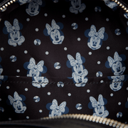 Minnie Mouse patterned interior lining inside the Loungefly Studs & Chains Mini Backpack