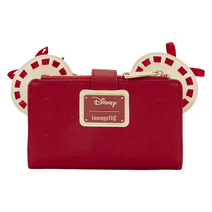 Back view of the Loungefly Disney Minnie Rocks The Dots wallet with Minnie ears, red stitched trim and a red polka dot bow.