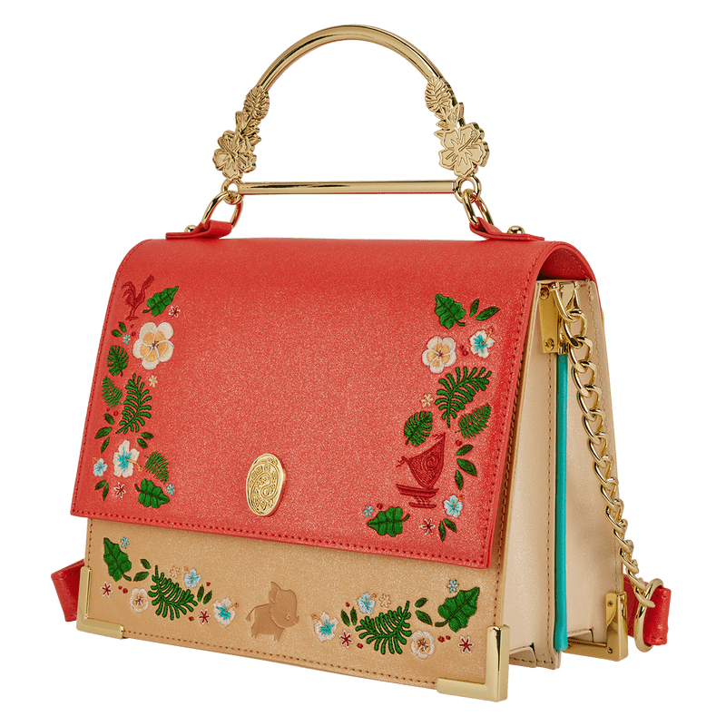 Angled view of Loungefly Disney Moana crossbody with gold handle and floral embroidery