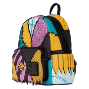 Side view of Loungefly Disney Sally mini backpack showing patchwork design wrapping around the panels

