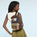 Model wearing Loungefly Disney Pirates of the Caribbean Jack Sparrow cosplay mini backpack