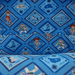 Blue Toy Story printed lining inside Loungefly backpack with Woody, Jessie and Buzz Lightyear pattern