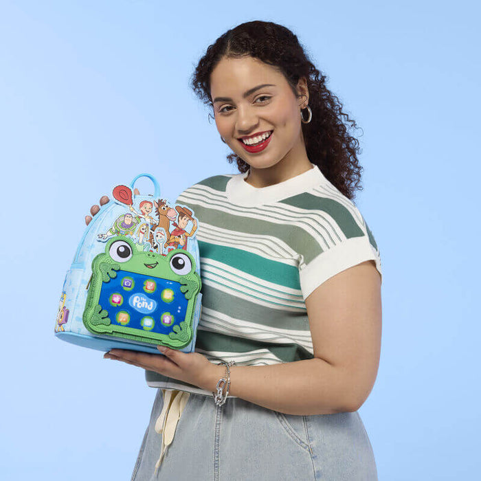 Model holding Loungefly Disney Pixar Toy Story The Pond backpack