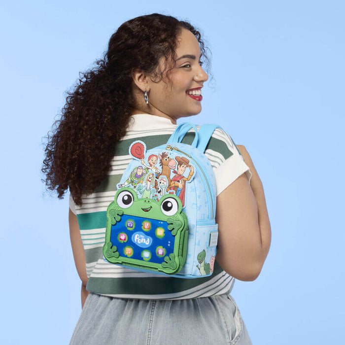 Model wearing Loungefly Disney Pixar Toy Story The Pond backpack