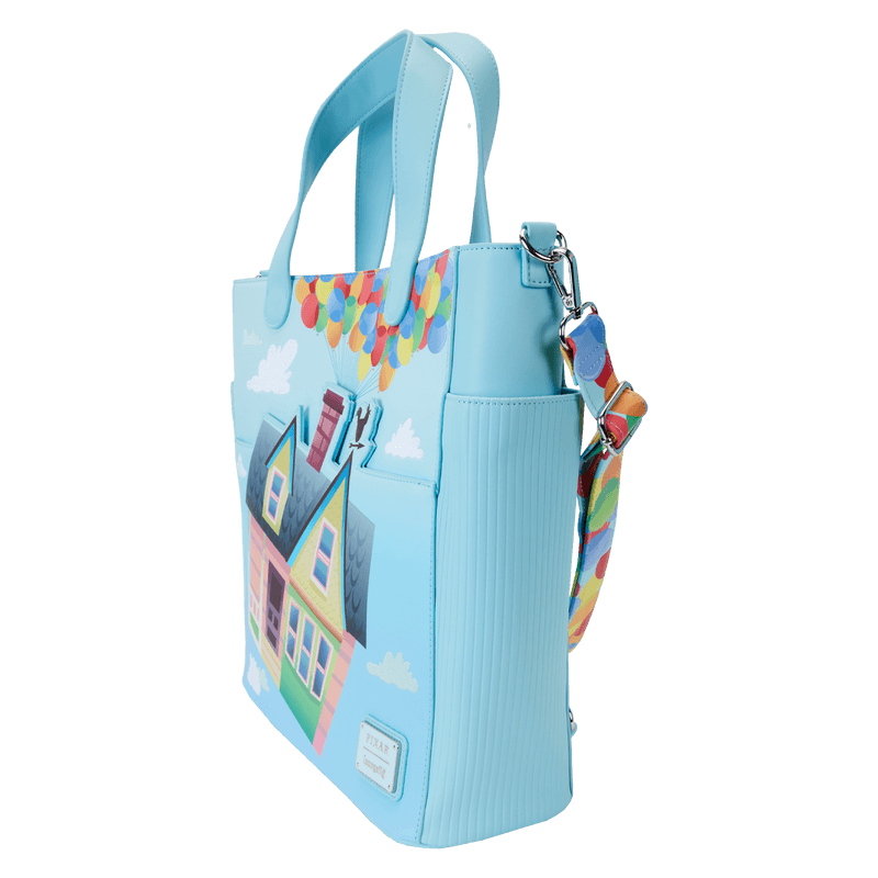 Angled front view of the Loungefly Disney Pixar Up 15th Anniversary Convertible Tote Bag with house artwork, balloon-print strap and cloud details