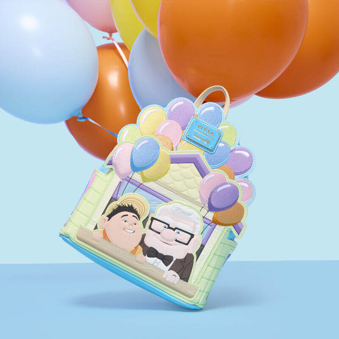 Loungefly Disney Pixar Up mini backpack displayed with colourful balloons