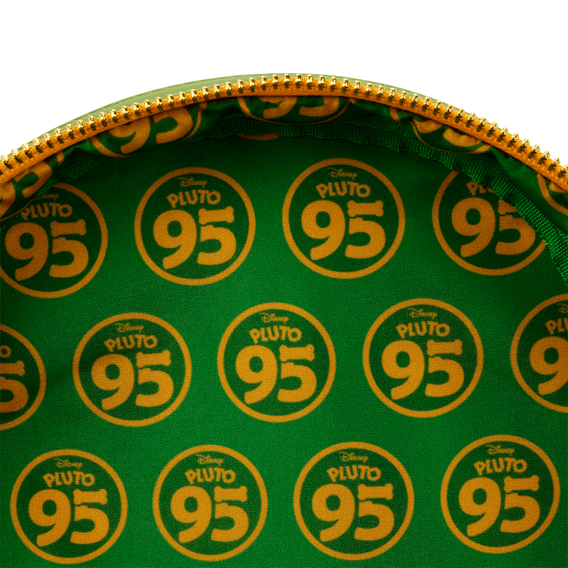 Interior lining of Loungefly Pluto 95th Anniversary mini backpack in green and yellow