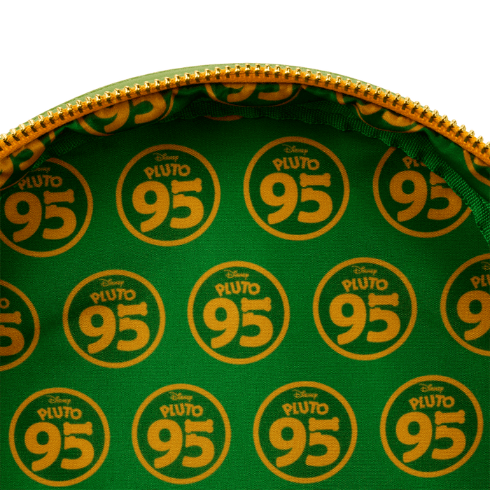 Interior lining of Loungefly Pluto 95th Anniversary mini backpack in green and yellow