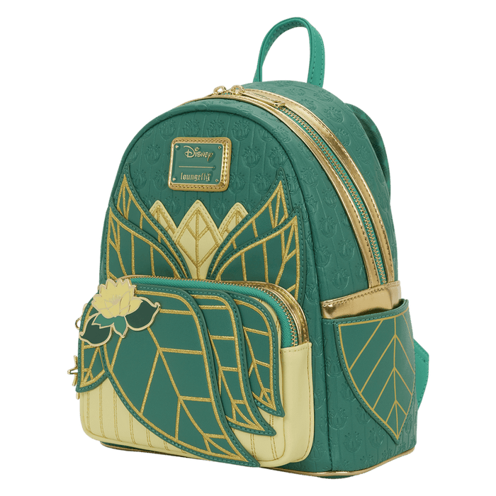 Angled front view of the Loungefly Disney The Princess and the Frog Tiana Cosplay Mini Backpack in green and gold with layered leaf design