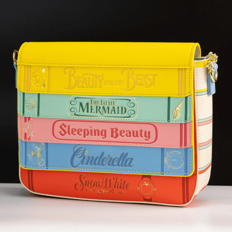 Loungefly Disney Princess Books crossbody bag styled as a stack of classic fairytale books including Beauty and the Beast, The Little Mermaid, Sleeping Beauty, Cinderella and Snow White