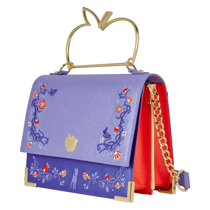 Angled view of Loungefly Snow White crossbody showing red side panels, gold chain