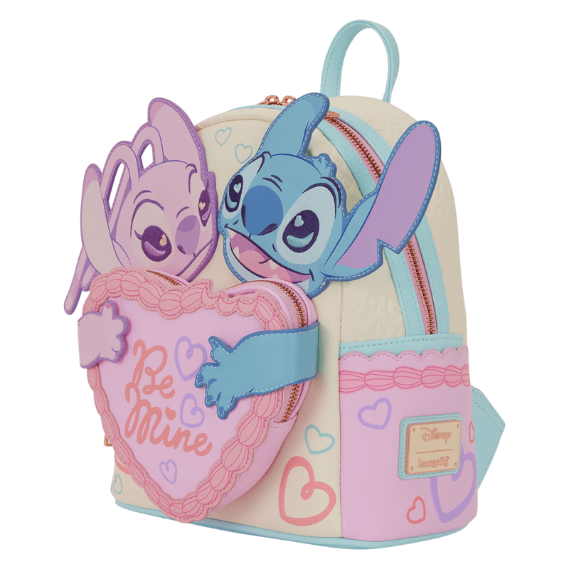 Angled view of Loungefly Disney Stitch and Angel Be Mine mini backpack with 3D character panels and heart pocket