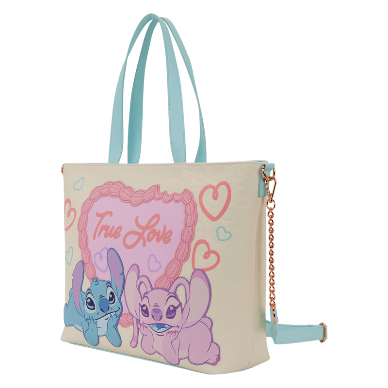 Angled view of the Loungefly Disney Stitch & Angel True Love tote bag showing light blue handles, detachable strap and gold chain detail.