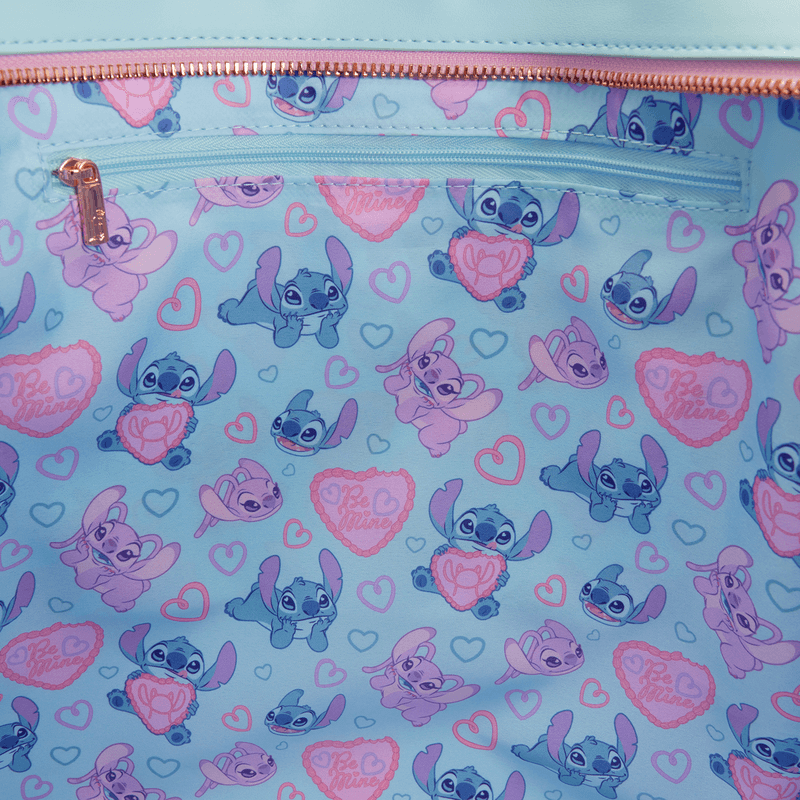 Close-up of the interior lining of the Loungefly Disney Stitch & Angel tote bag with cute character icons, hearts and Be Mine details.