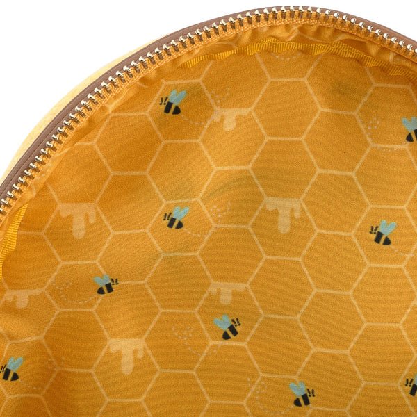 Honeycomb interior lining with buzzing bees inside Loungefly Winnie the Pooh Hunny Tummy mini backpack
