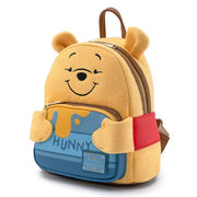 Side view of Loungefly Winnie the Pooh Hunny Tummy backpack showing red shirt strap and blue pot zip pocket
