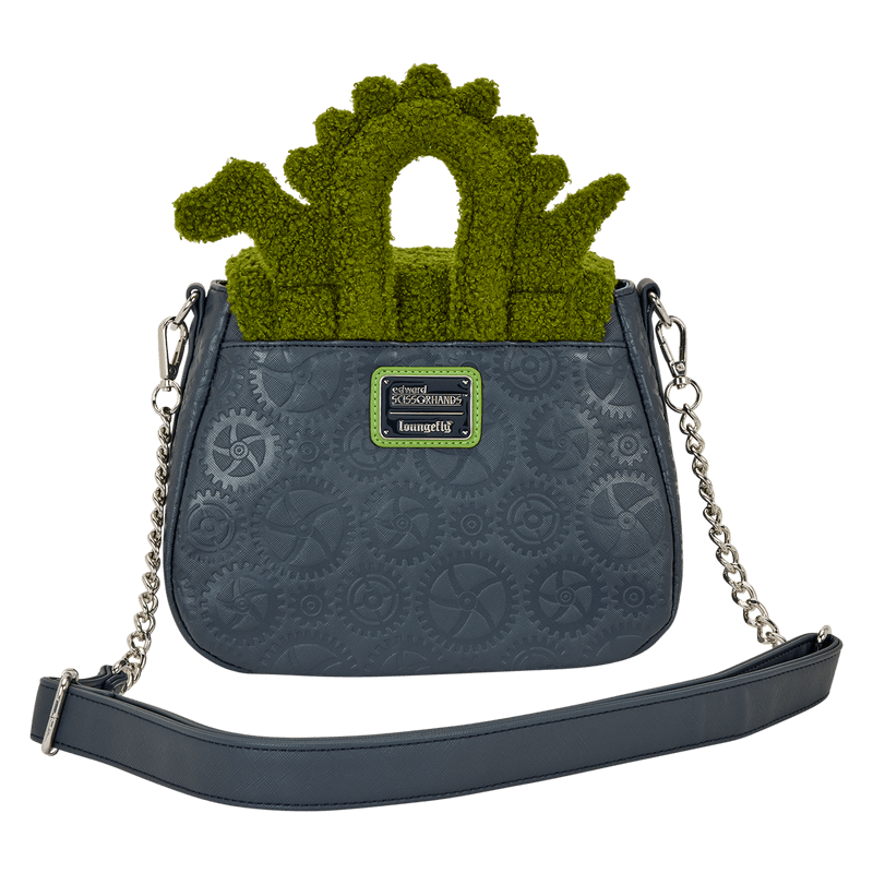 Back view of the Loungefly Edward Scissorhands crossbody bag showing the adjustable strap, chain details and embossed gear pattern with Loungefly badge.