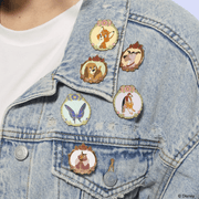 Loungefly The Fox and the Hound mystery enamel pins displayed on a denim jacket