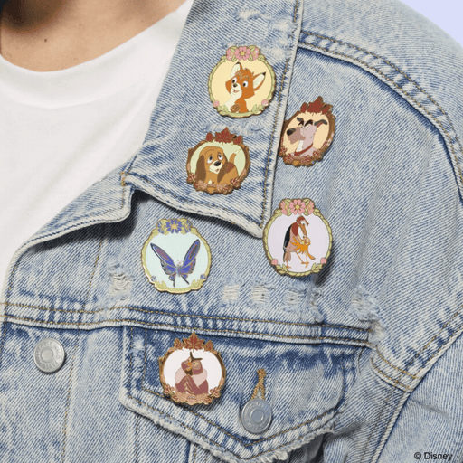 Loungefly The Fox and the Hound mystery enamel pins displayed on a denim jacket