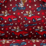 Interior lining of the Loungefly Gizmo backpack with Gizmo driving car and motorbike pattern on red.