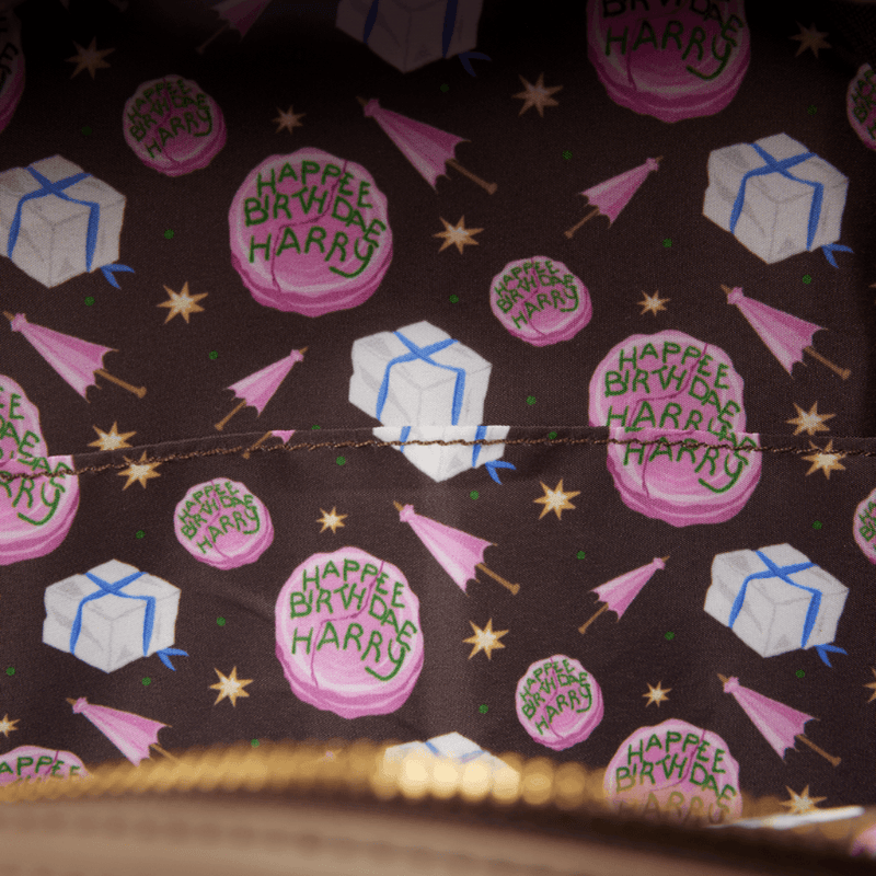 Harry Potter birthday cake and present print lining inside Loungefly Hagrid Mini Backpack
