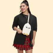 Model wearing Loungefly Harry Potter Hedwig crossbody bag owl design