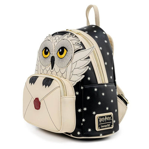 Side view of the Loungefly Harry Potter Hedwig Howler Cosplay Mini Backpack showing star print, Hedwig applique and branded plaque
