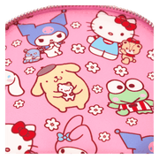 Close-up of printed lining showing Hello Kitty, Keroppi and Kuromi inside Loungefly mini backpack – Loungefly bags
