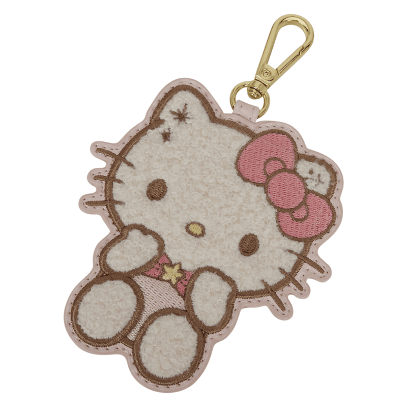 Detachable plush Hello Kitty bag charm with pink embroidered bow, fluffy white face and gold-tone clasp