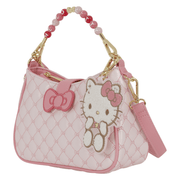 Loungefly Sanrio Hello Kitty Holiday Quilted Crossbody Bag in pink with beaded Hello Kitty handle, bow detail and plush character charm