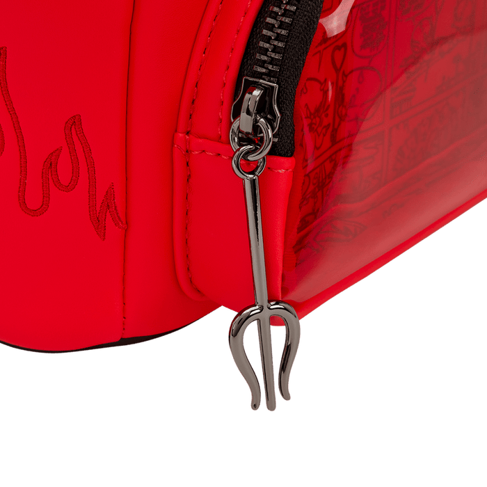 Silver trident zip pull detail on the Loungefly Hot Stuff mini backpack front pocket.