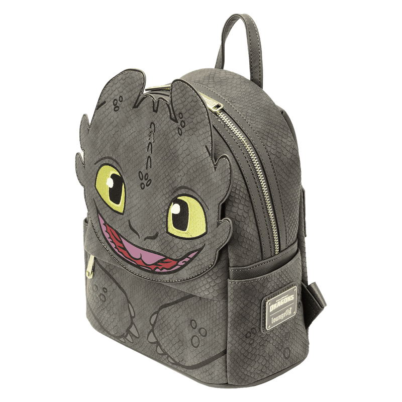 Angled view of Loungefly Toothless cosplay mini backpack with 3D face front pocket and scale print
