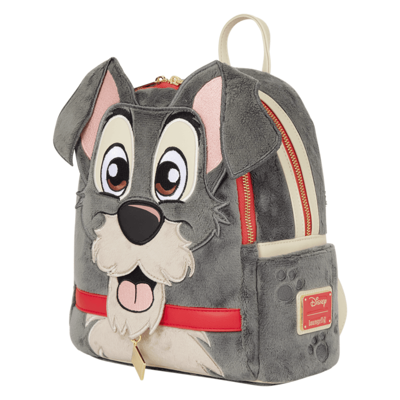 Side view of Loungefly Tramp Plush Mini Backpack showing embroidered face, floppy ears, paw-print detailing and gold-tone zips