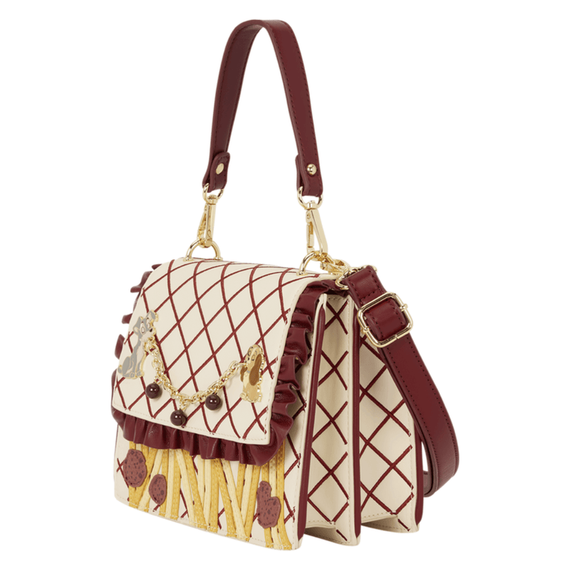 Side angle of Loungefly Lady and the Tramp spaghetti handbag showing adjustable strap, gold-tone chain and faux leather details