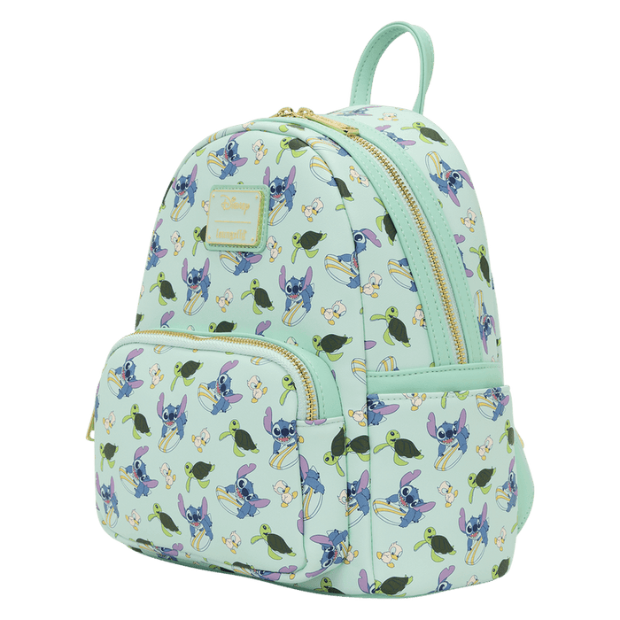 Angled front view of the Loungefly Disney Lilo & Stitch Animal Friends All-Over Print Mini Backpack in mint green with Stitch, turtles and ducklings