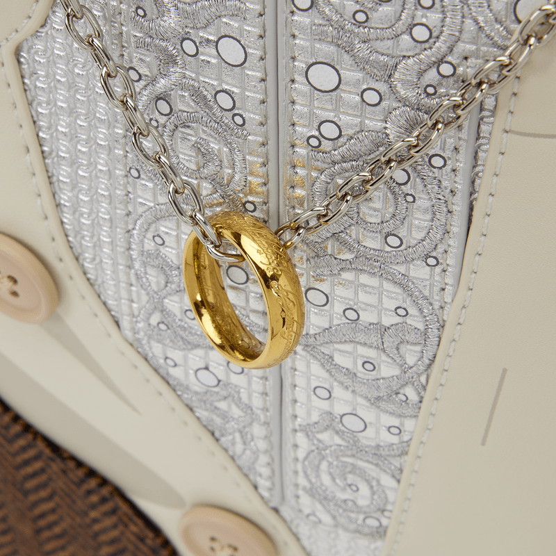Close up of the Loungefly The Lord of the Rings Frodo Mithril Cosplay Mini Backpack showing the ring charm and mithril-inspired front detailing