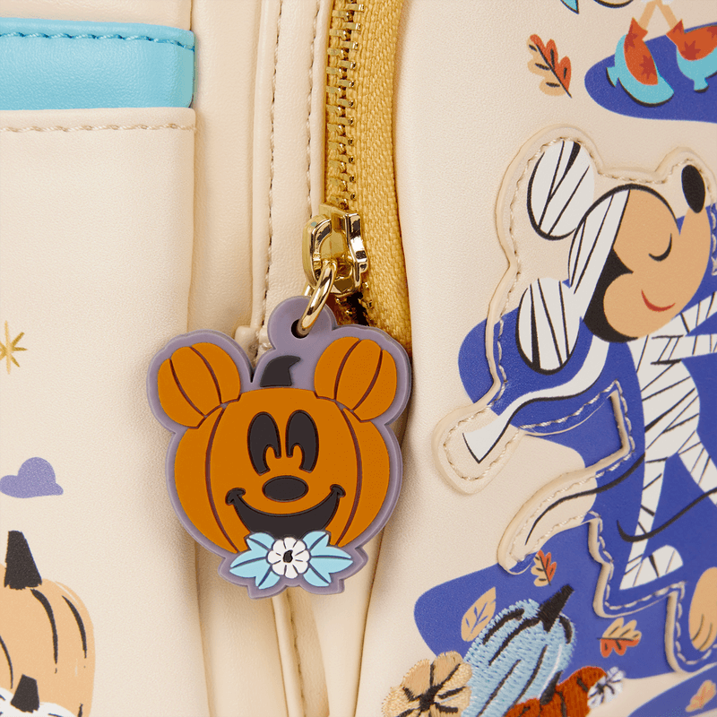 Mickey pumpkin zipper charm detail on the Loungefly Mickey and Friends Halloween mini backpack