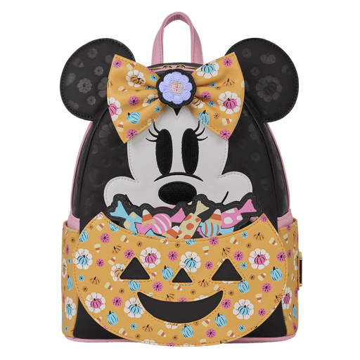Straight-on front shot of Loungefly Disney Minnie Mouse Halloween mini backpack showing bow detail and candy-filled pumpkin pocket