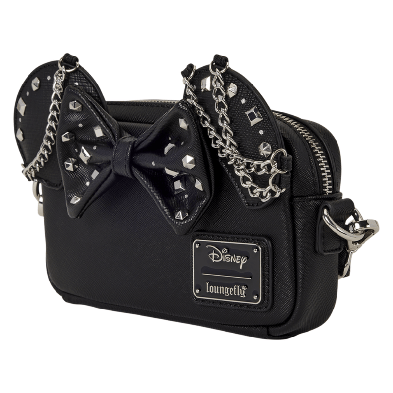 Angled view of the black Minnie Mouse Loungefly Crossbody Bag with bow, chains and studs
