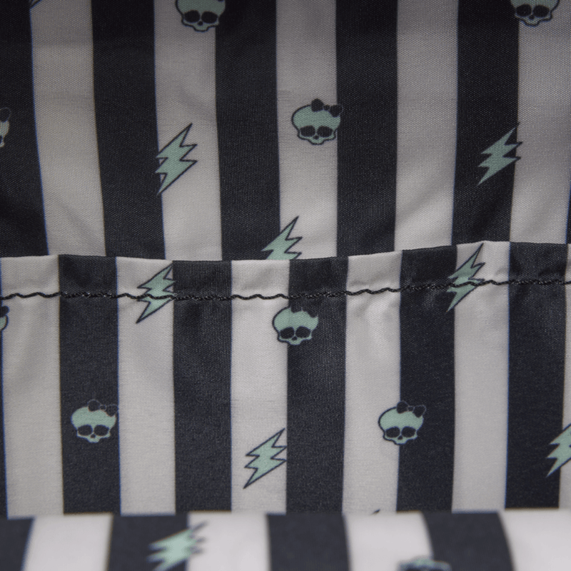 Monster High Frankie Stein Loungefly backpack interior lining with black stripes skulls and lightning bolts