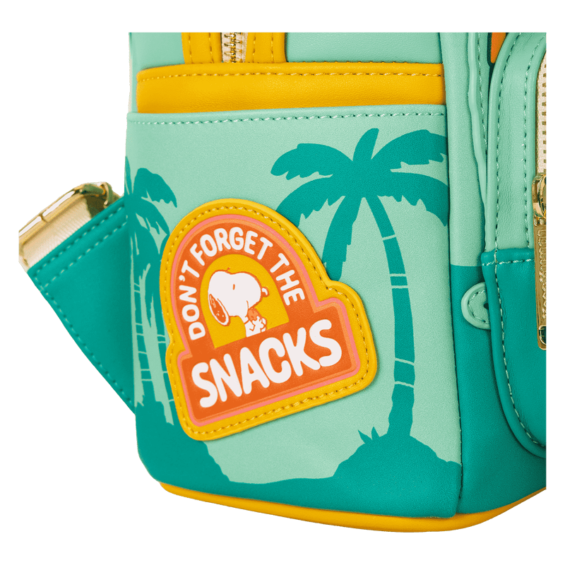 Side pocket patch on Loungefly Peanuts Snoopy Road Trip mini backpack reading “Don’t forget the snacks” – Loungefly backpack
