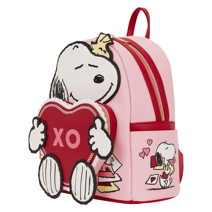 Angled view of Loungefly Peanuts Snoopy XO mini backpack showing heart side artwork and red zip detailing