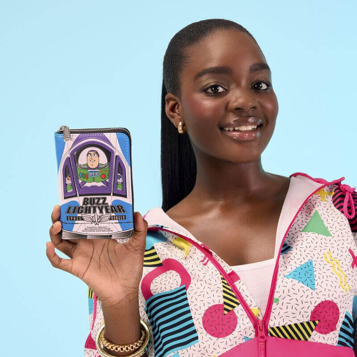 Model holding the Loungefly Buzz Lightyear Toy Story zip-around wallet.
