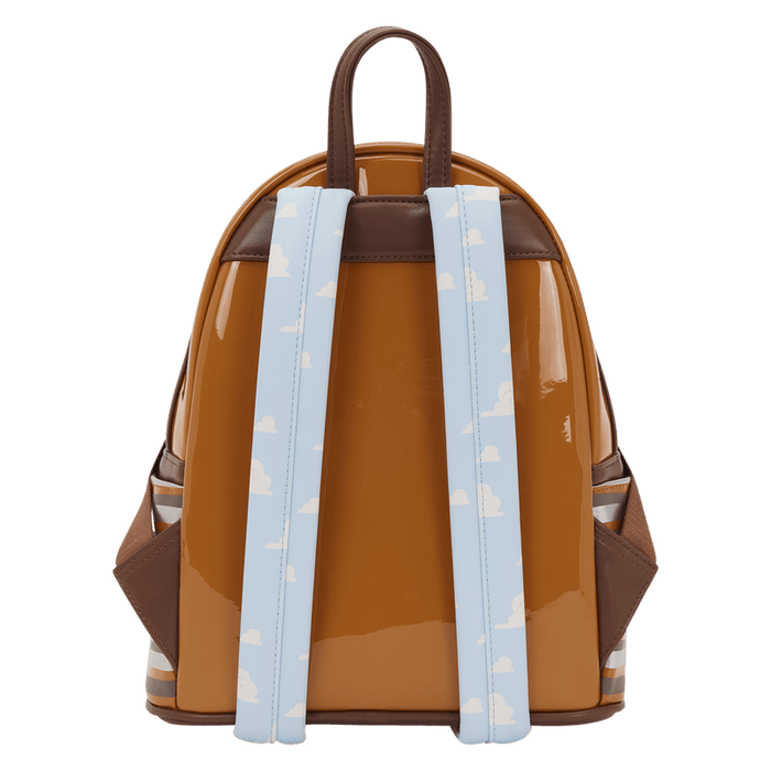 Back of Loungefly Pixar Toy Story Slinky Dog mini backpack with cloudy sky shoulder straps