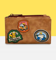 Front view of Loungefly Pokémon Camper Wallet featuring Pikachu, Eevee, and Snorlax embroidered-style patches