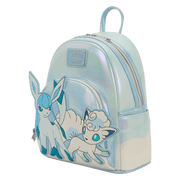 Angled view of the Loungefly Pokémon Ice Type Winter mini backpack showing iridescent material and front character detail.