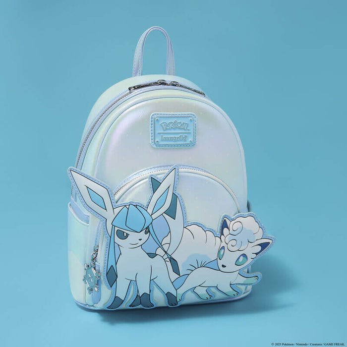 Loungefly Pokémon Ice Type Winter mini backpack with Glaceon and Alolan Vulpix on an iridescent blue front pocket.
