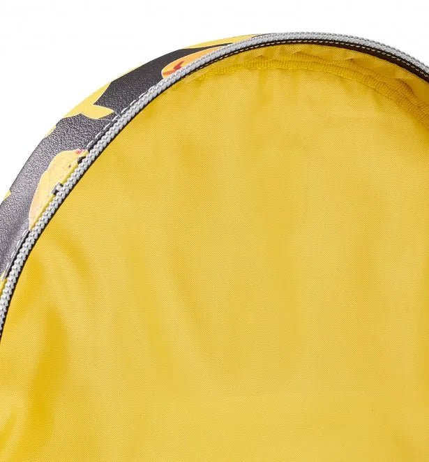 Interior lining of the Loungefly Pikachu backpack in plain yellow fabric