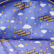 Interior lining of the Loungefly Pokémon backpack with “Gotta Catch ’Em All” text, stars, and clouds